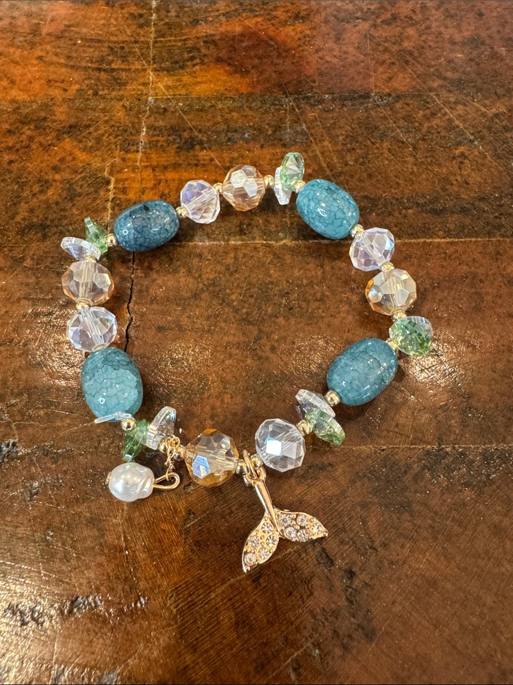 Teal Beaded Stretch Bracelet with Gold Mermaid Tail Charm